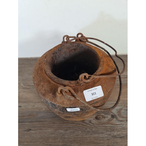 311 - A cast iron glue pot - approx. 18cm high 20cm diameter