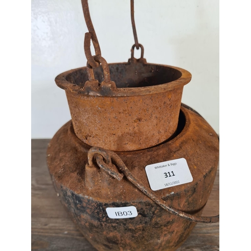 311 - A cast iron glue pot - approx. 18cm high 20cm diameter