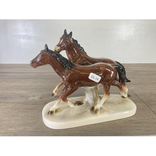 247 - Four ceramic horse figurines - largest approx. 27cm high