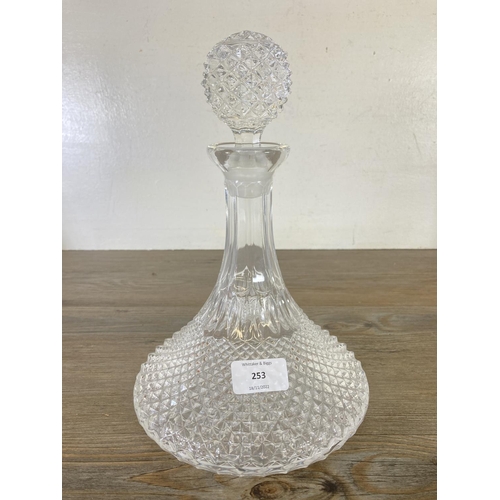 253 - Five cut glass decanters - largest approx. 32cm high