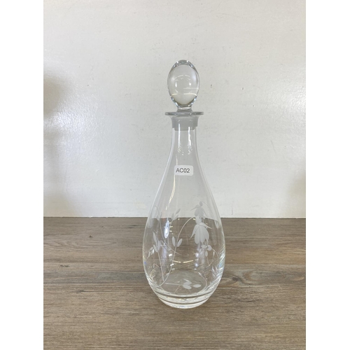 253 - Five cut glass decanters - largest approx. 32cm high