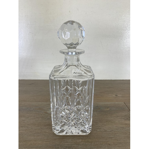 253 - Five cut glass decanters - largest approx. 32cm high