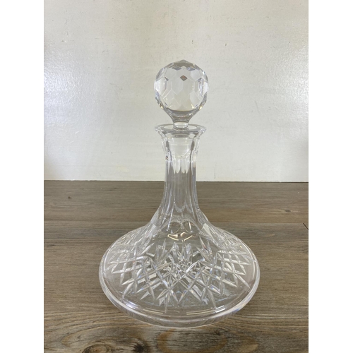 253 - Five cut glass decanters - largest approx. 32cm high