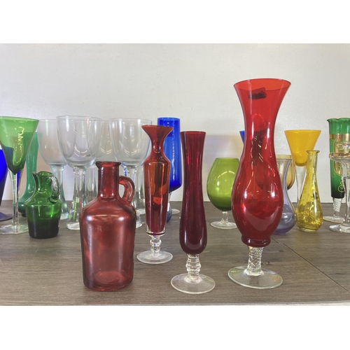 254 - A collection of mid 20th century coloured glassware