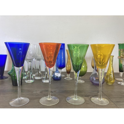 254 - A collection of mid 20th century coloured glassware