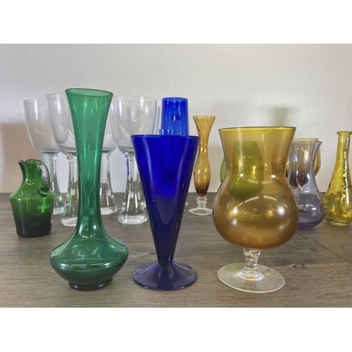 254 - A collection of mid 20th century coloured glassware