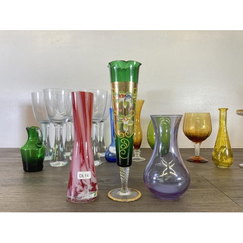 254 - A collection of mid 20th century coloured glassware