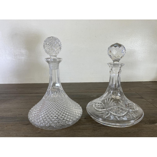 255 - Six glass decanters - largest approx. 29cm high