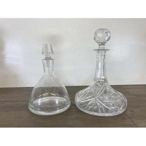 255 - Six glass decanters - largest approx. 29cm high