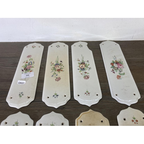 256 - Eight hand painted ceramic door plates - approx. 28cm high x 8cm wide