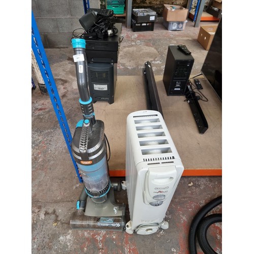 827 - Two items, one Vax U87-MA-PE upright bagless vacuum cleaner and one De'Longhi Dragon Two electric ra... 