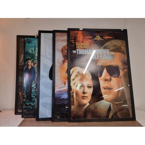 789 - Five framed movie posters, Harry Potter and the Deathly Hallows, Pirates of the Carribean, Casino Ro... 