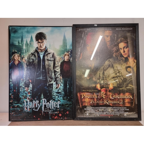 789 - Five framed movie posters, Harry Potter and the Deathly Hallows, Pirates of the Carribean, Casino Ro... 