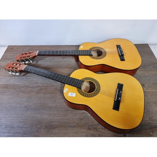 790 - Two child's Herald MG104N nylon strung classical guitars