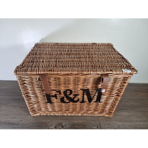 532 - A Fortnum & Mason wicker basket - approx. 41cm high x 59cm wide x 42cm deep