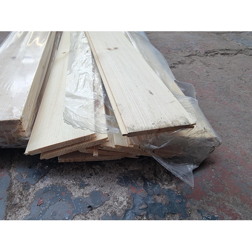 553 - A collection of pine slats - approx. 247cm high x 10cm wide