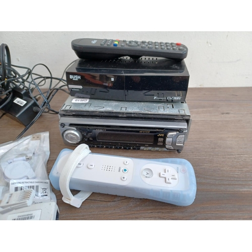 727 - A collection of items to include Nintendo DS Lite hand held games console, JVC car stereo, Bush Free... 