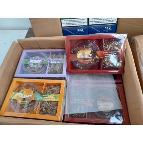 757 - Four boxes, two containing boxed Airpure ashtrays with scented grain smoke refresher kits and two co... 