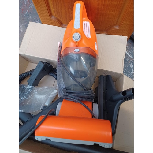 825 - Three items, one boxed Morphy Richards Grime Buster steam cleaner, one handheld vacuum cleaner and o... 