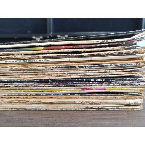 777 - Two record cases containing a collection of LP, 12