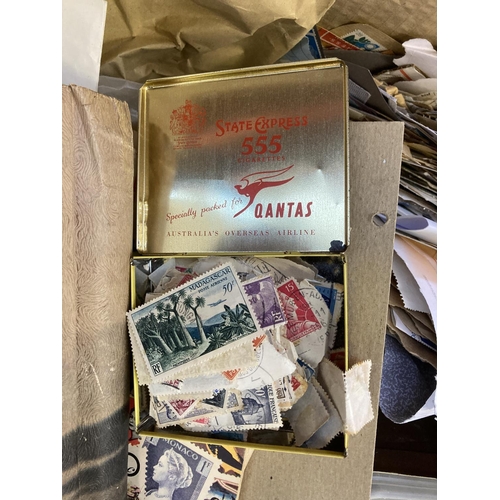 843 - A box containing a collection of world stamps