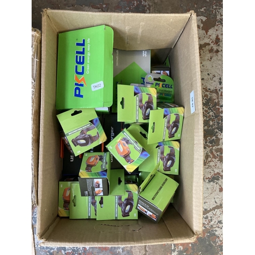 849 - Two boxes containing a large quantity of rechargeable batteries, boxed USB chargers and approx. twen... 