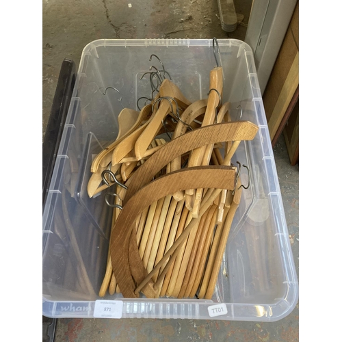 871 - A box containing wooden coat hangers to include some vintage examples