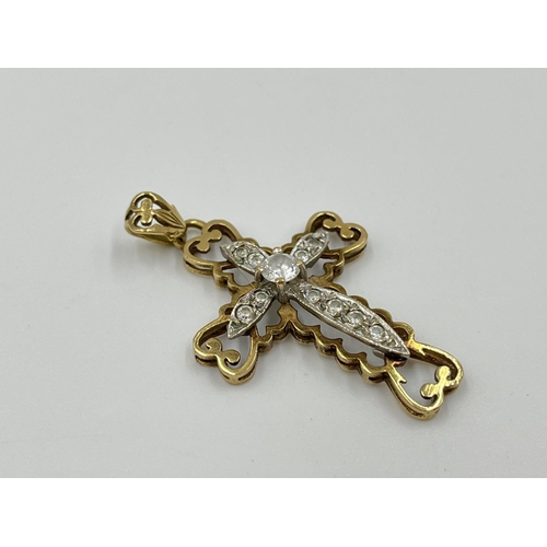 1077 - A hallmarked Sheffield 9ct gold and moissanite cross pendant - approx. gross weight 3.74 grams