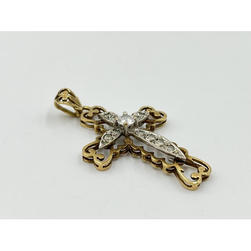 1077 - A hallmarked Sheffield 9ct gold and moissanite cross pendant - approx. gross weight 3.74 grams