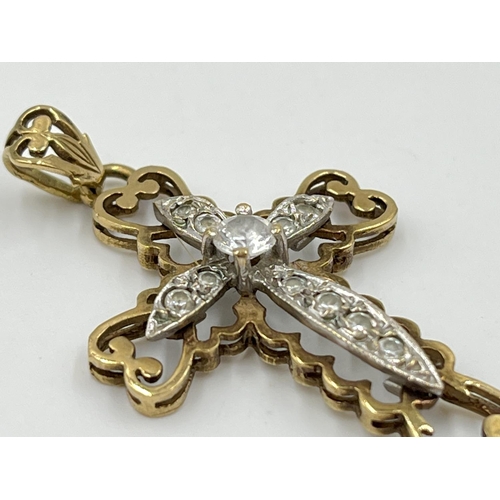 1077 - A hallmarked Sheffield 9ct gold and moissanite cross pendant - approx. gross weight 3.74 grams