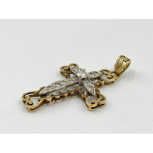 1077 - A hallmarked Sheffield 9ct gold and moissanite cross pendant - approx. gross weight 3.74 grams