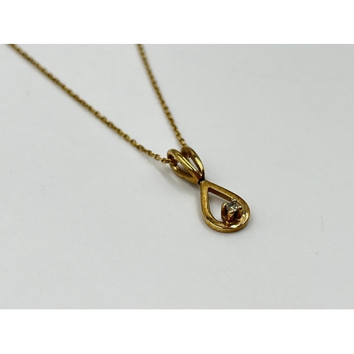 1078 - A 9ct gold and diamond 24cm pendant necklace - approx. gross weight 1.34 grams