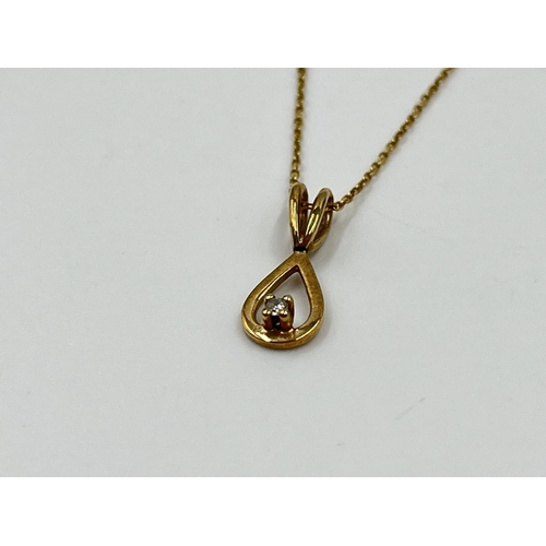 1078 - A 9ct gold and diamond 24cm pendant necklace - approx. gross weight 1.34 grams