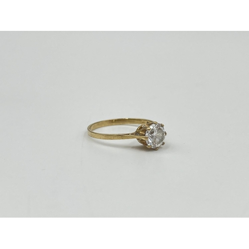 1081 - A hallmarked Birmingham 9ct gold and clear gemstone solitaire ring, size M - approx. gross weight 1.... 