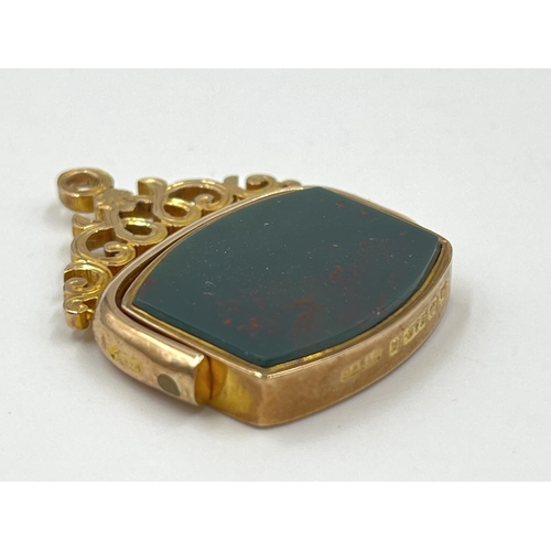 1083 - A George V Constantine & Floyd Ltd. hallmarked Birmingham 9ct gold bloodstone swivel fob, dated 1921... 