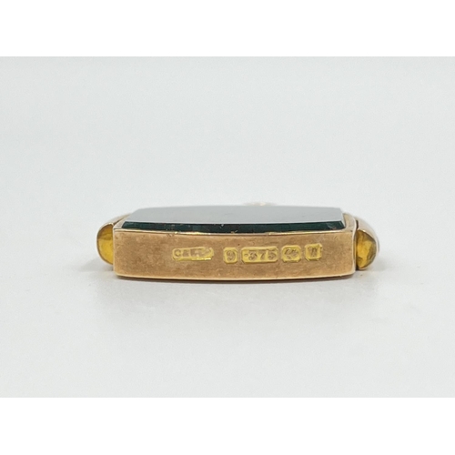 1083 - A George V Constantine & Floyd Ltd. hallmarked Birmingham 9ct gold bloodstone swivel fob, dated 1921... 