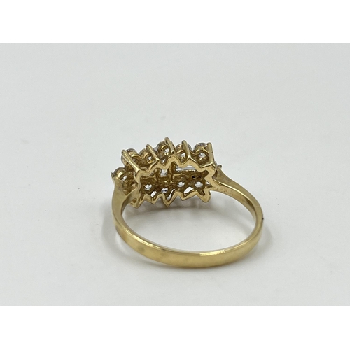 1091 - A hallmarked Birmingham 9ct gold CZ cluster dress ring, size O - approx. gross weight 2.96 grams