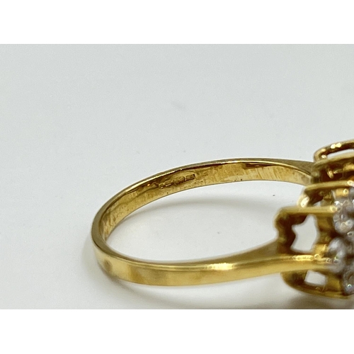 1091 - A hallmarked Birmingham 9ct gold CZ cluster dress ring, size O - approx. gross weight 2.96 grams