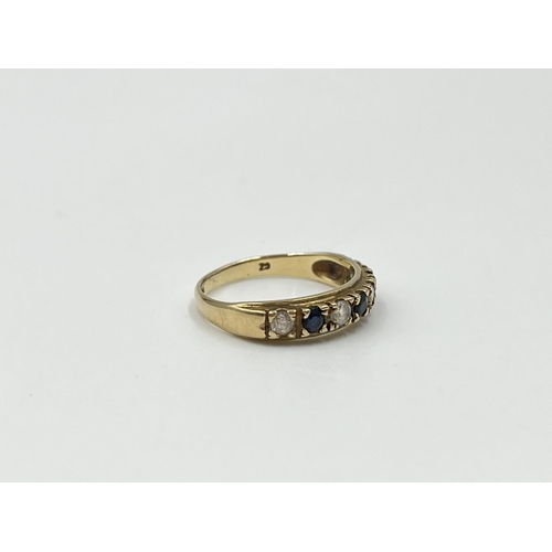 1093 - A hallmarked Birmingham 9ct gold sapphire and CZ ring, size K - approx. gross weight 1.64 grams