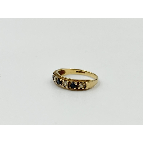 1093 - A hallmarked Birmingham 9ct gold sapphire and CZ ring, size K - approx. gross weight 1.64 grams