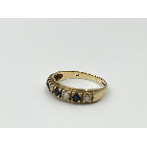 1093 - A hallmarked Birmingham 9ct gold sapphire and CZ ring, size K - approx. gross weight 1.64 grams