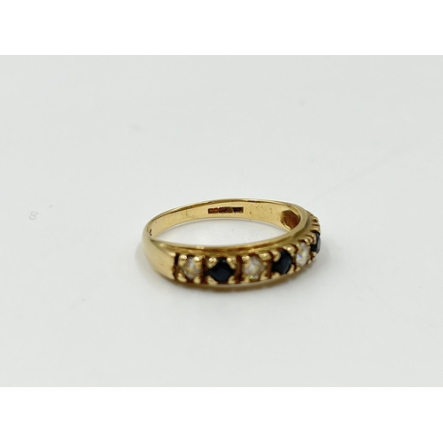 1093 - A hallmarked Birmingham 9ct gold sapphire and CZ ring, size K - approx. gross weight 1.64 grams