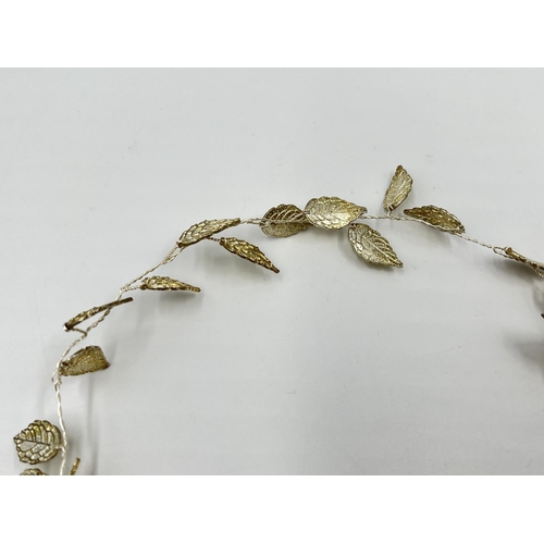 1096 - Two items, one white metal Grecian leaf hair vine and one white metal leaf brooch