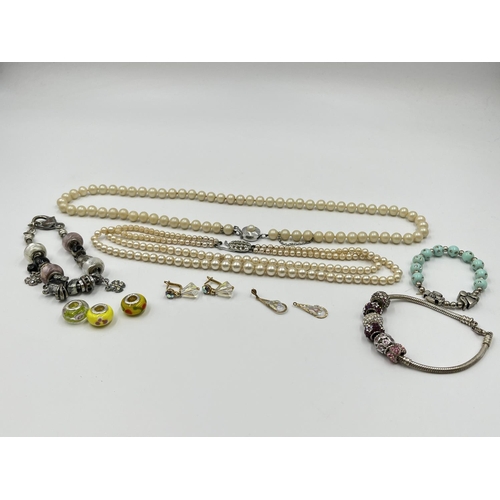 1097 - A collection of costume jewellery to include 925 silver charm bracelet with six charms, three stampe... 