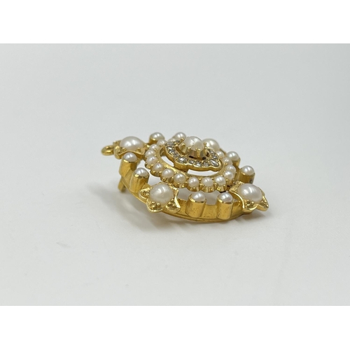 1123 - A 19th century yellow metal diamond and seed pearl brooch/pendant - approx. gross weight 7.6 grams a... 