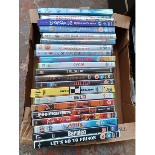 760 - Five boxes containing a collection of CDs and DVDs; sealed DVDs to include Take That, Mrs Doubtfire,... 