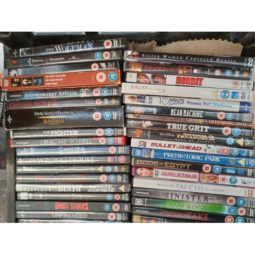 762 - Two boxes containing a collection of DVDs - see images for titles