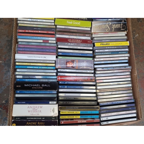 765 - A box containing a collection of CDs - see images for titles