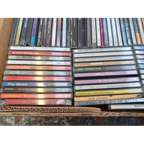 766 - Two boxes containing a collection of CDs - see images for titles