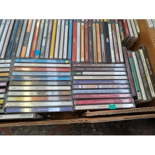 766 - Two boxes containing a collection of CDs - see images for titles